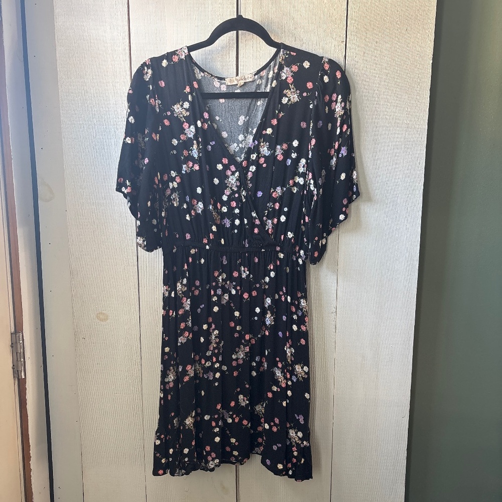 Woman’s black floral flowy summer dress
